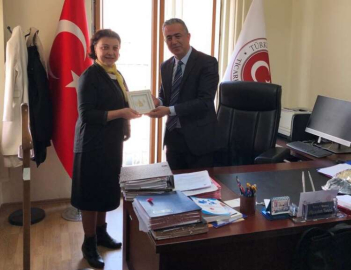 Ayarcı’dan Tunalı’ya Plaket